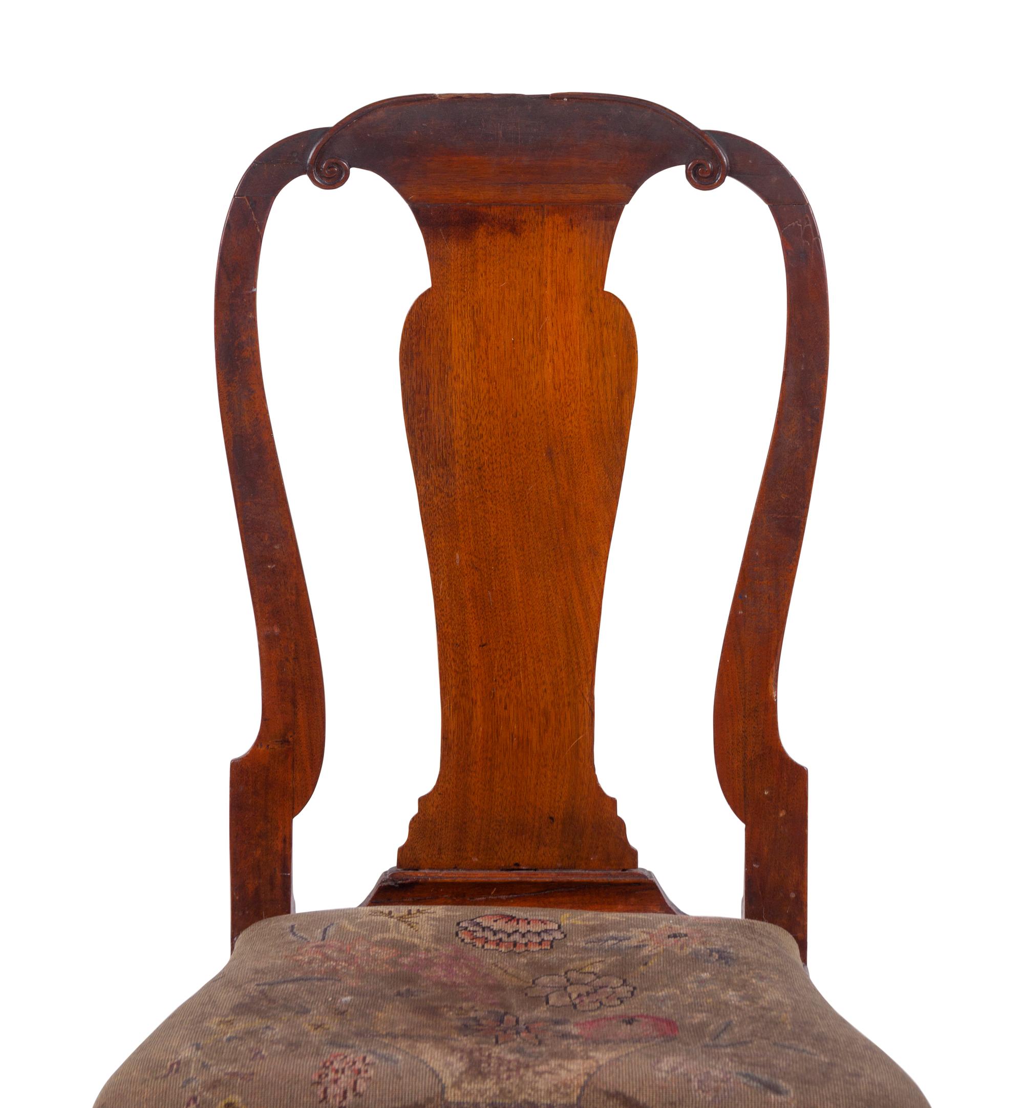 A Queen Anne Volute Carved Walnut Flat-Stretcher Pad-Foot Side Chair