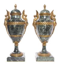 A Pair of Neoclassical Gilt Bronze Mounted Marble Urns Height 22 1/2 inches.