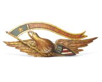A Carved and Painted Giltwood Eagle