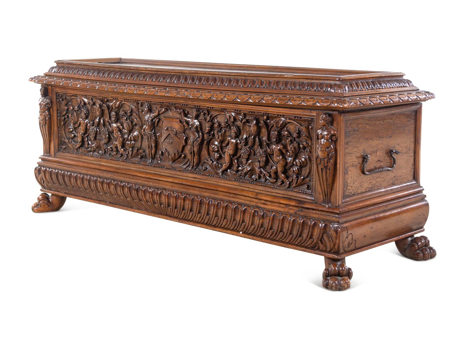 An Italian Carved Walnut Cassone
