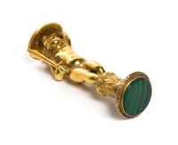 A Continental Gilt Metal Figural Seal, Height 3 7/8 inches.