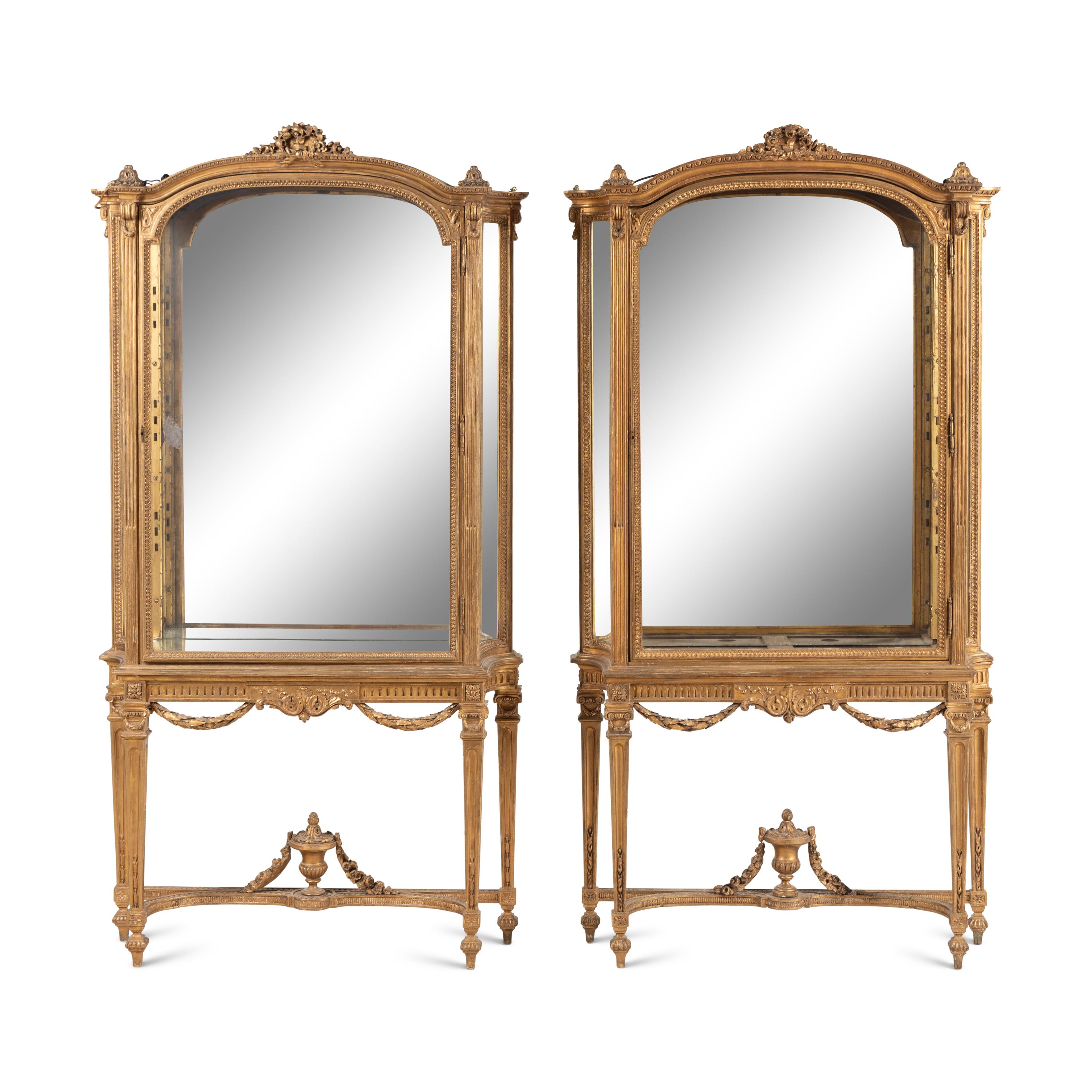 A Pair of Louis XVI Style Giltwood Vitrine Cabinets