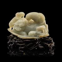 A Chinese Pale Celadon Jade 'Three Rams' Carving 青白玉三羊開泰