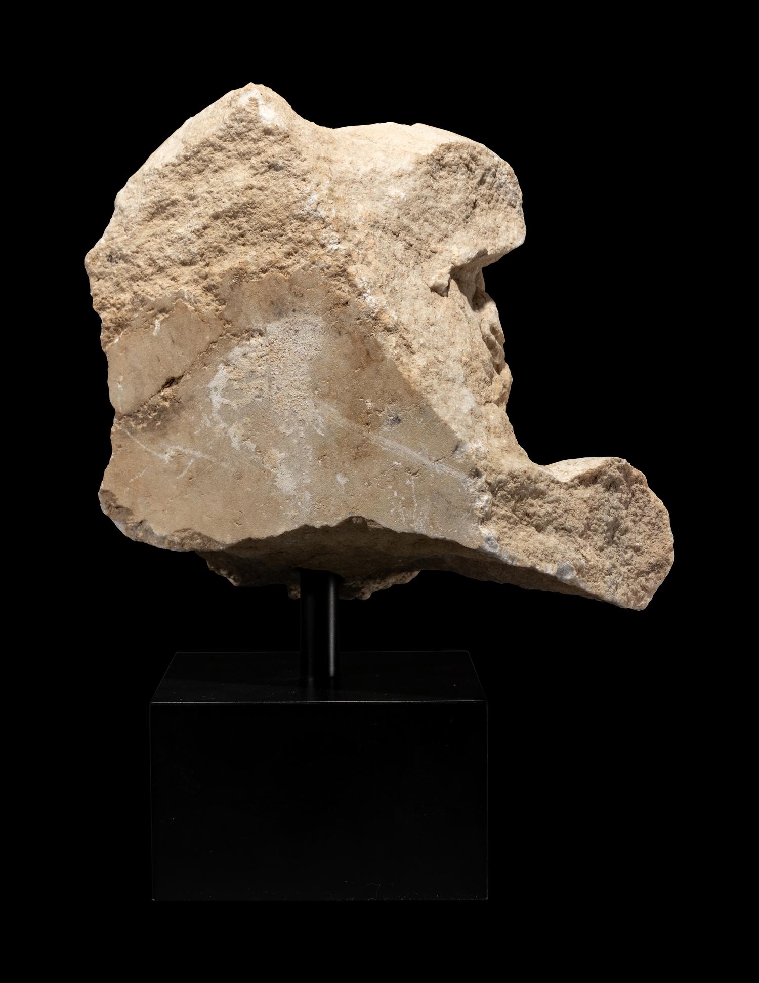 A Roman Marble Bearded Head, Perhaps a Giant, from a Relief