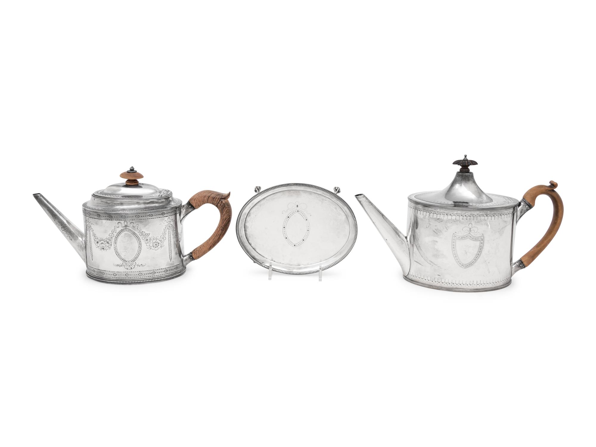 Two Hester Bateman George III Silver Teapots and a Teapot Stand
