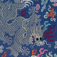 A Chinese Blue Ground Brocade 'Dragon' Robe, Jifu, Late Qing Dynasty 清晚期 藍地織錦云龍紋吉服