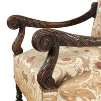 A Pair of Louis XIII Style Carved Oak Fauteuils