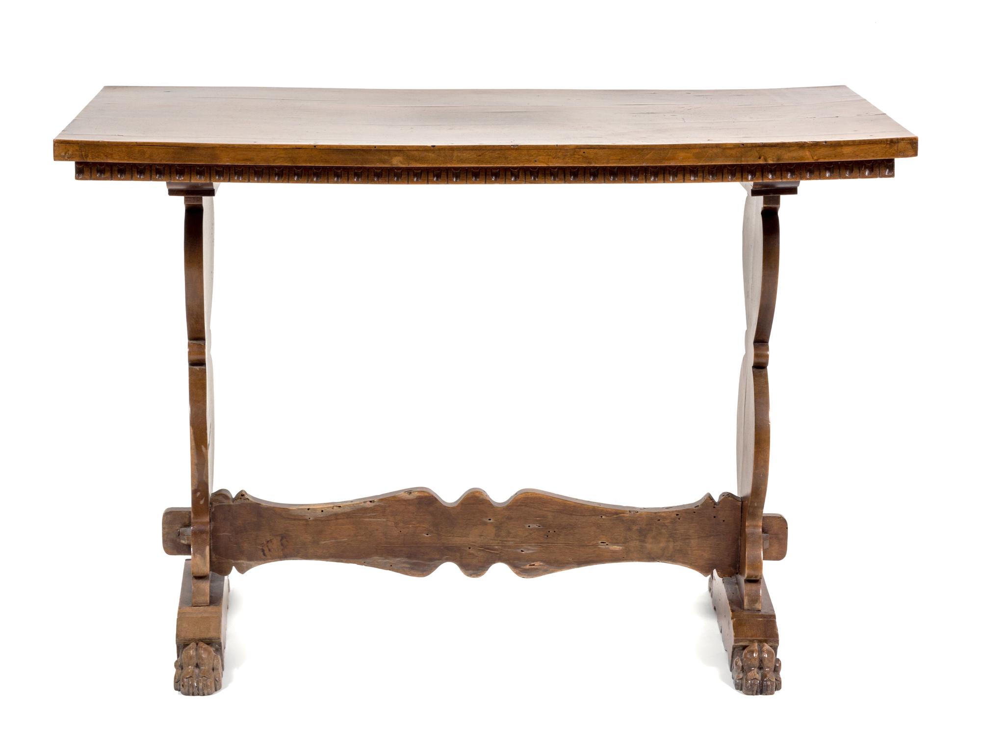 An Italian Walnut Trestle Table Height 39 x width 21 1/2 x depth 27 inches.