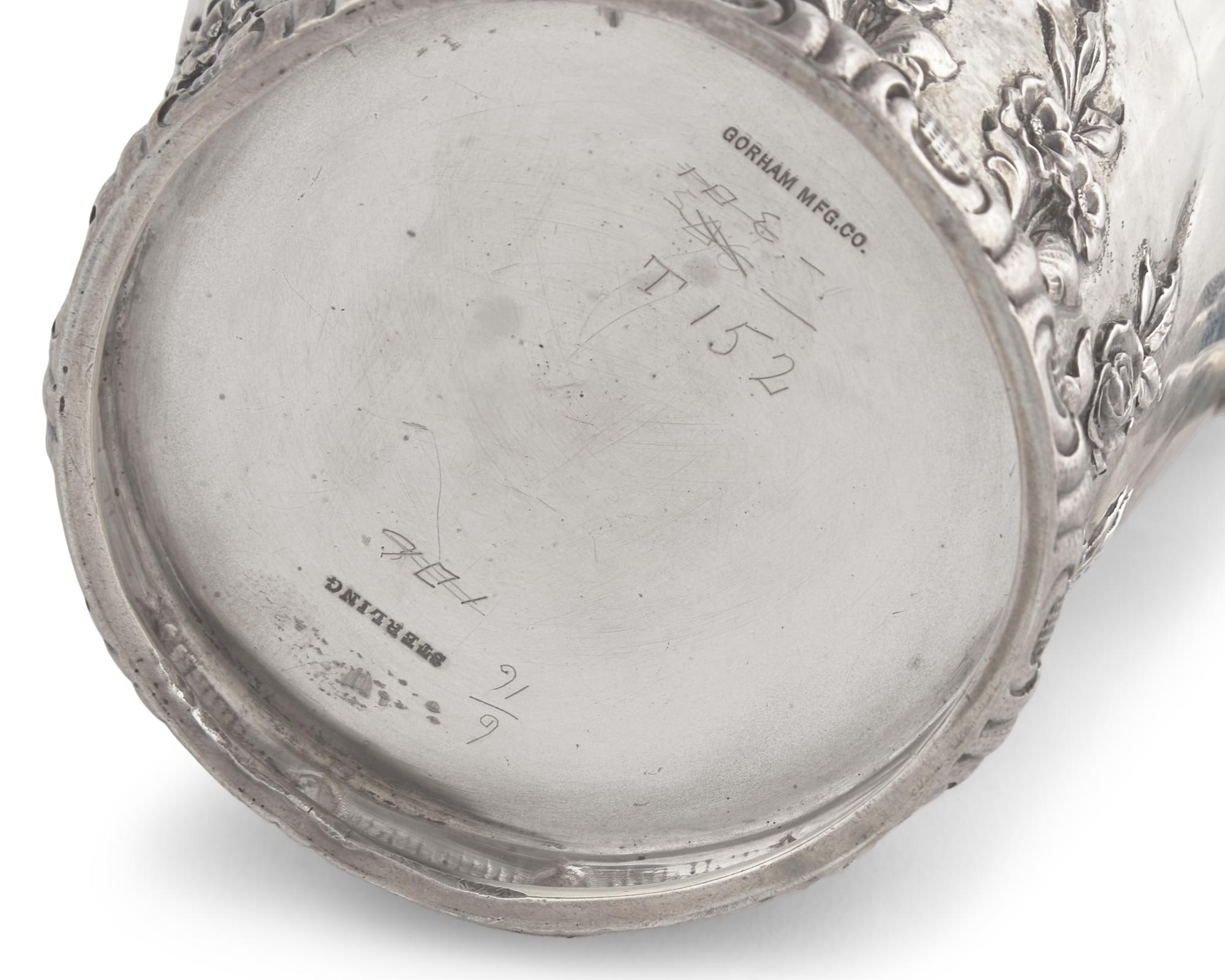 A Presentation Sterling Silver Floral Repousse Syrup Pitcher Awarded to Mrs. Washington Augustus Roebling, Gorham Mfg. Co., Providence, RI, Circa 1890s