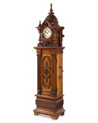 A Symphonion Style 38B Eroica Upright Three Disc Music Box with Clock