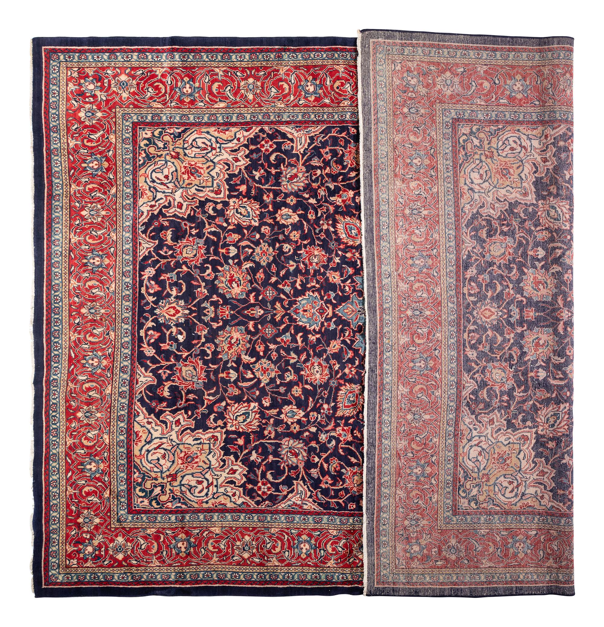 A Qom Wool Rug