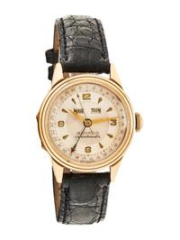 MOVADO, REF. 4635 14K YELLOW GOLD 'CALENDOMATIC' TRIPLE CALENDAR WATCH