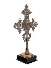 A Coptic Silvered Metal Processional Cross on Stand
