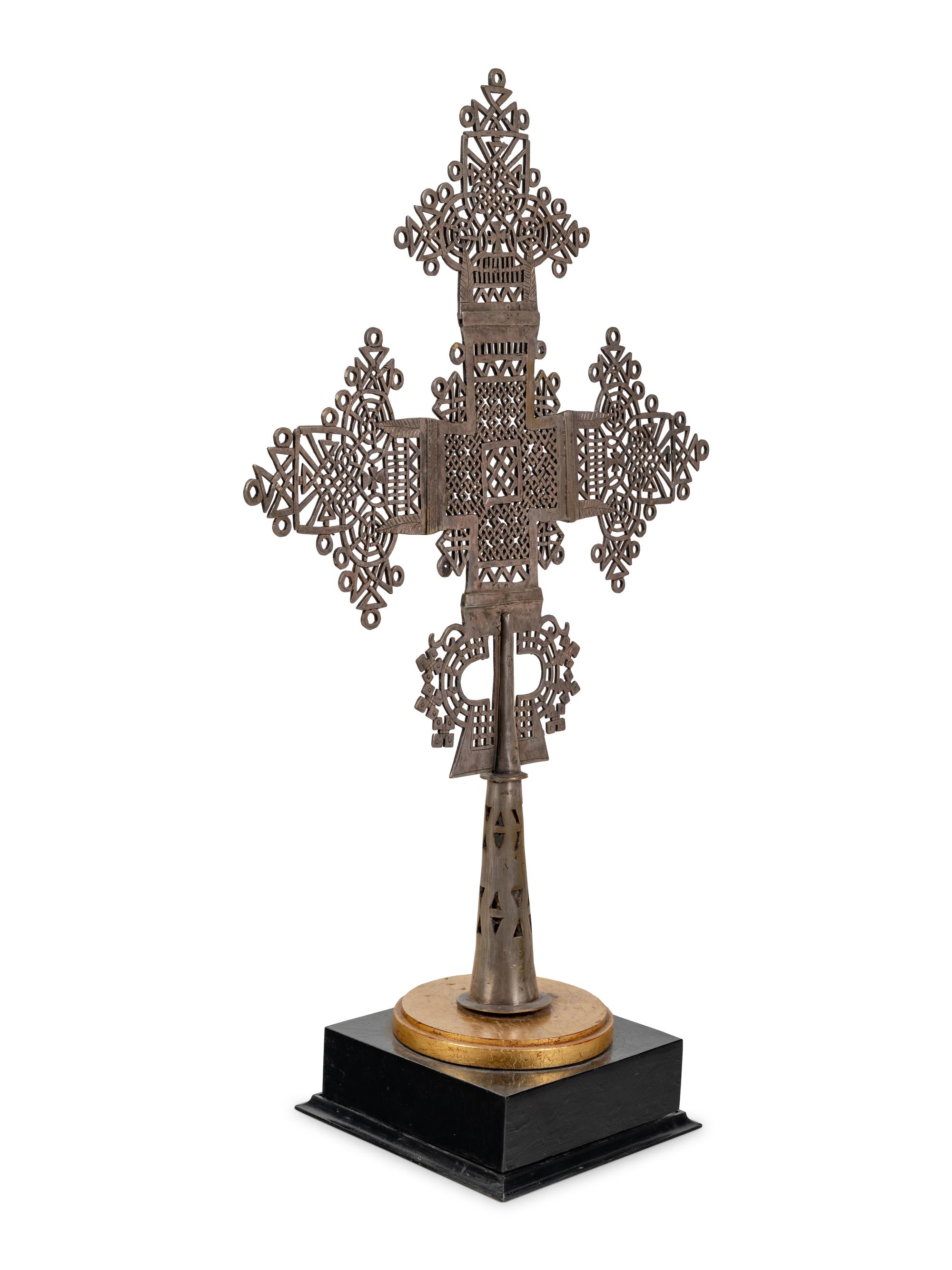 A Coptic Silvered Metal Processional Cross on Stand