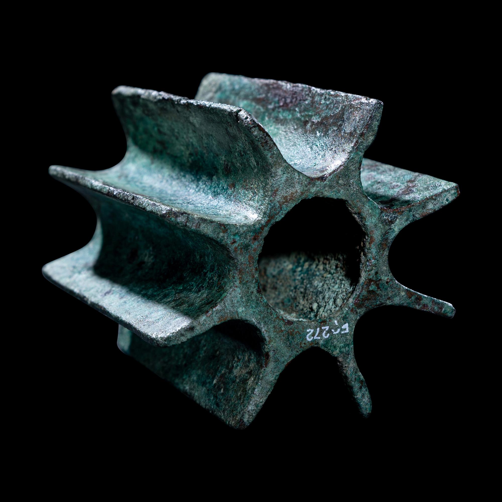 A Viscus Bronze Fluted Mace Head