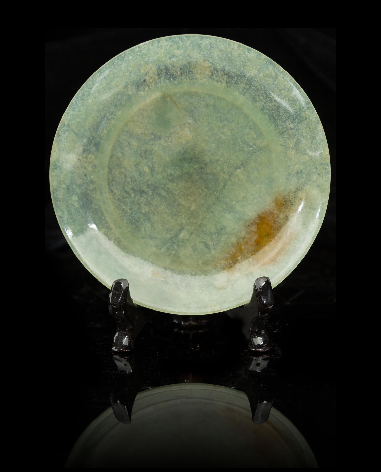 A Green Jade Circular Dish Diameter 4 1/8 inches.