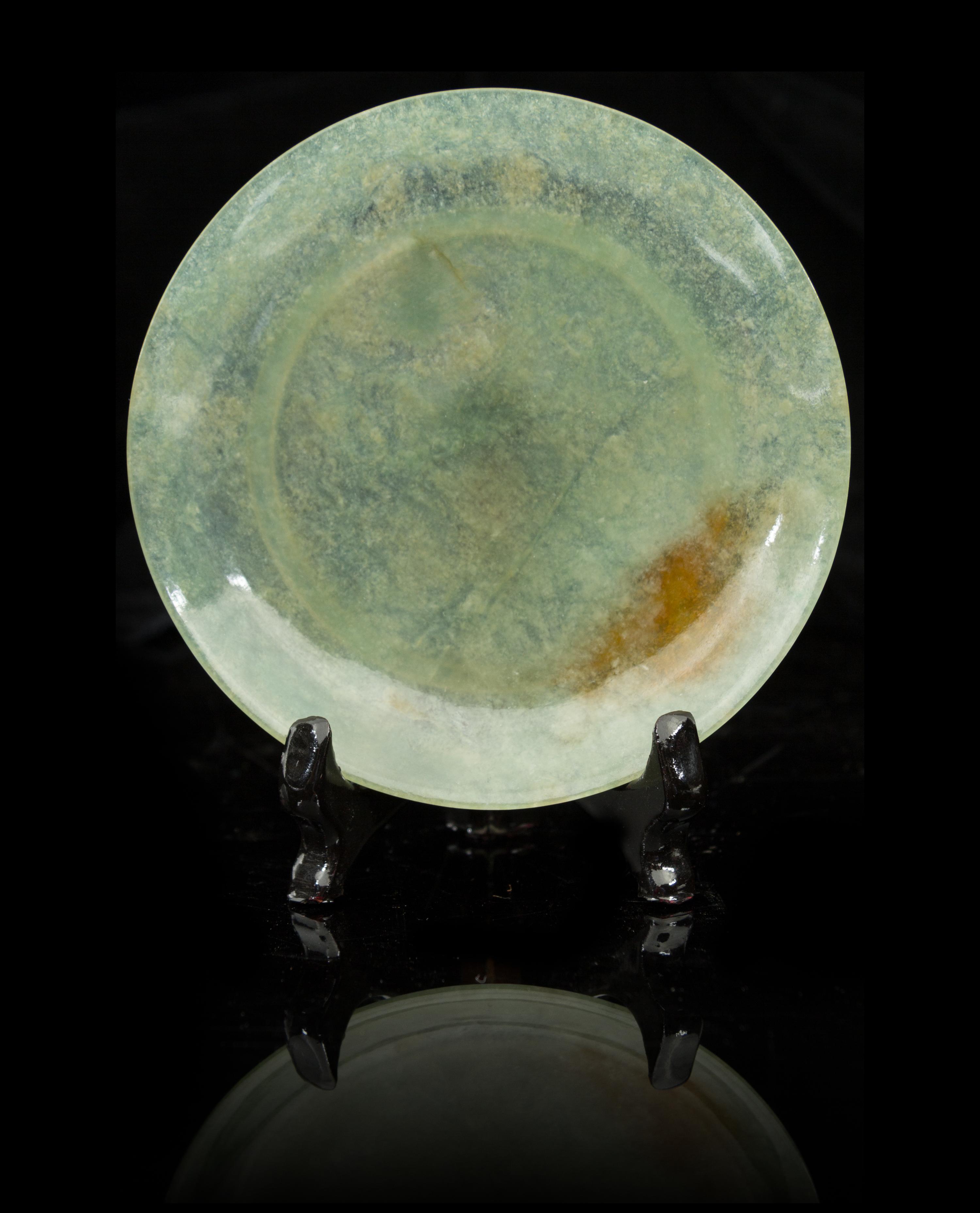 A Green Jade Circular Dish Diameter 4 1/8 inches.