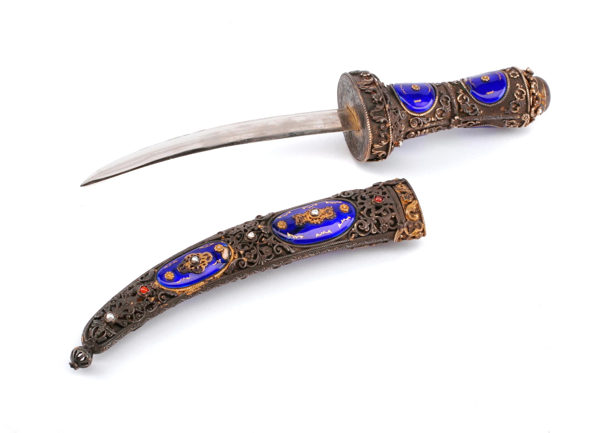 An Eastern European Silvered, Jeweled and Enameled Dagger Length 11 1/2 inches.