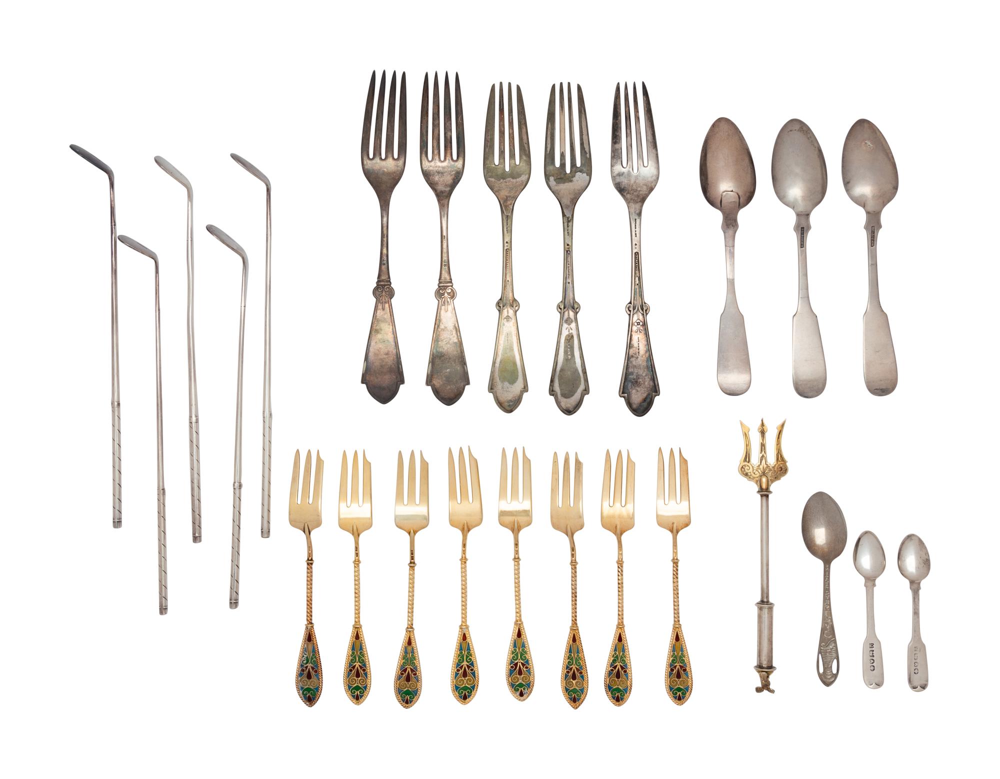 A Large Collection of Silver and Silver-Plate Flatware Articles