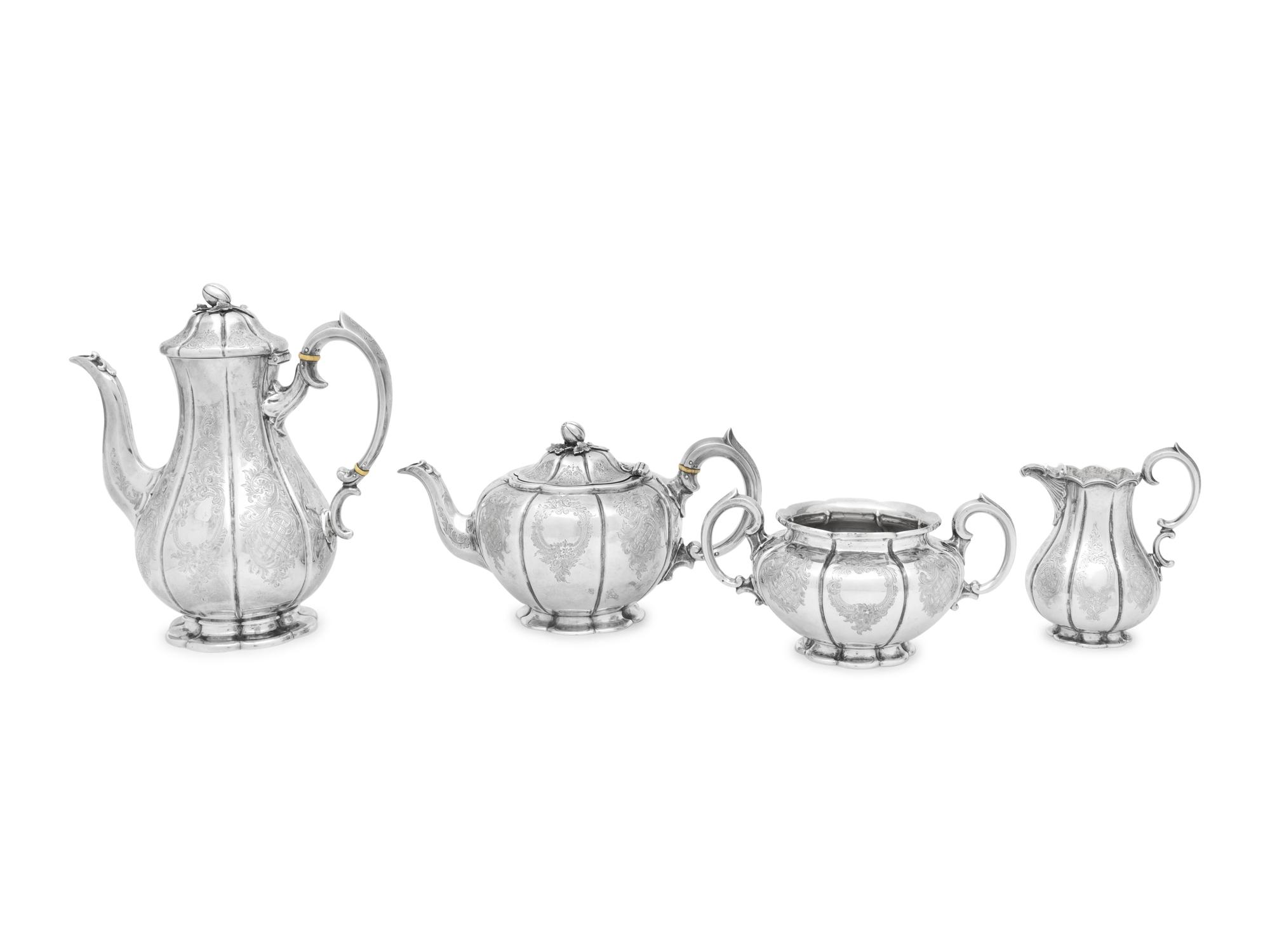 A Cased Victorian Silver Four-Piece Tea and Coffee Service