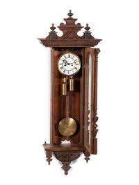 A Walnut Case Wall Clock