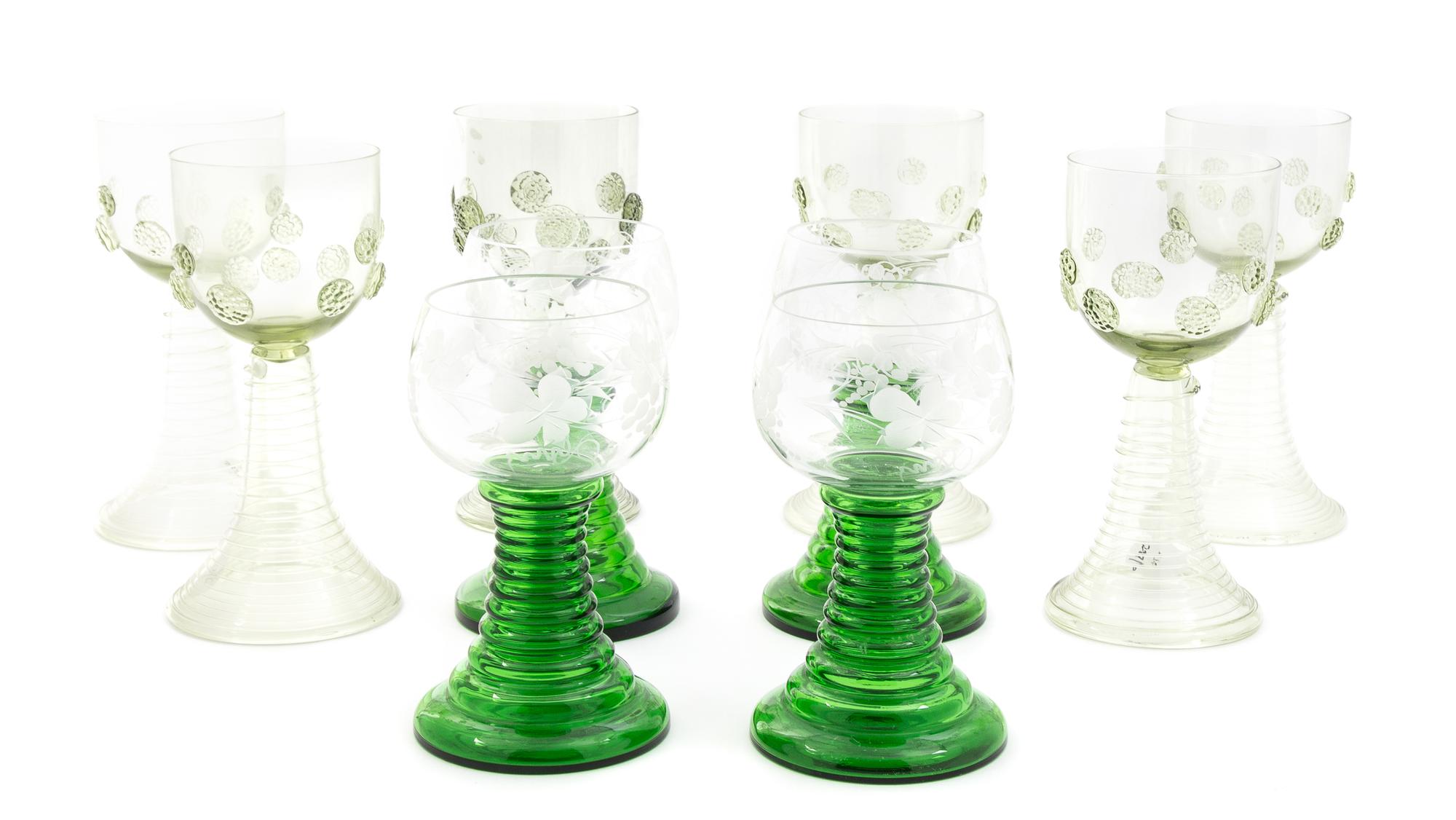 A Set of Six Juliska Glass Wine Stems Height of taller set 7 inches.