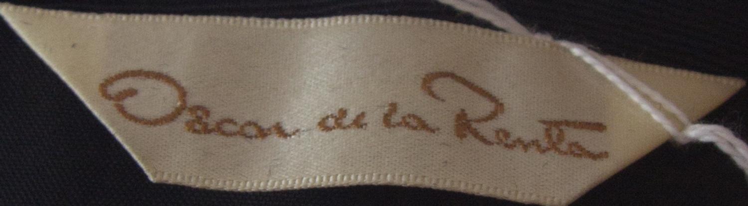 An Oscar de la Renta Black Velvet Bolero, Size 10.