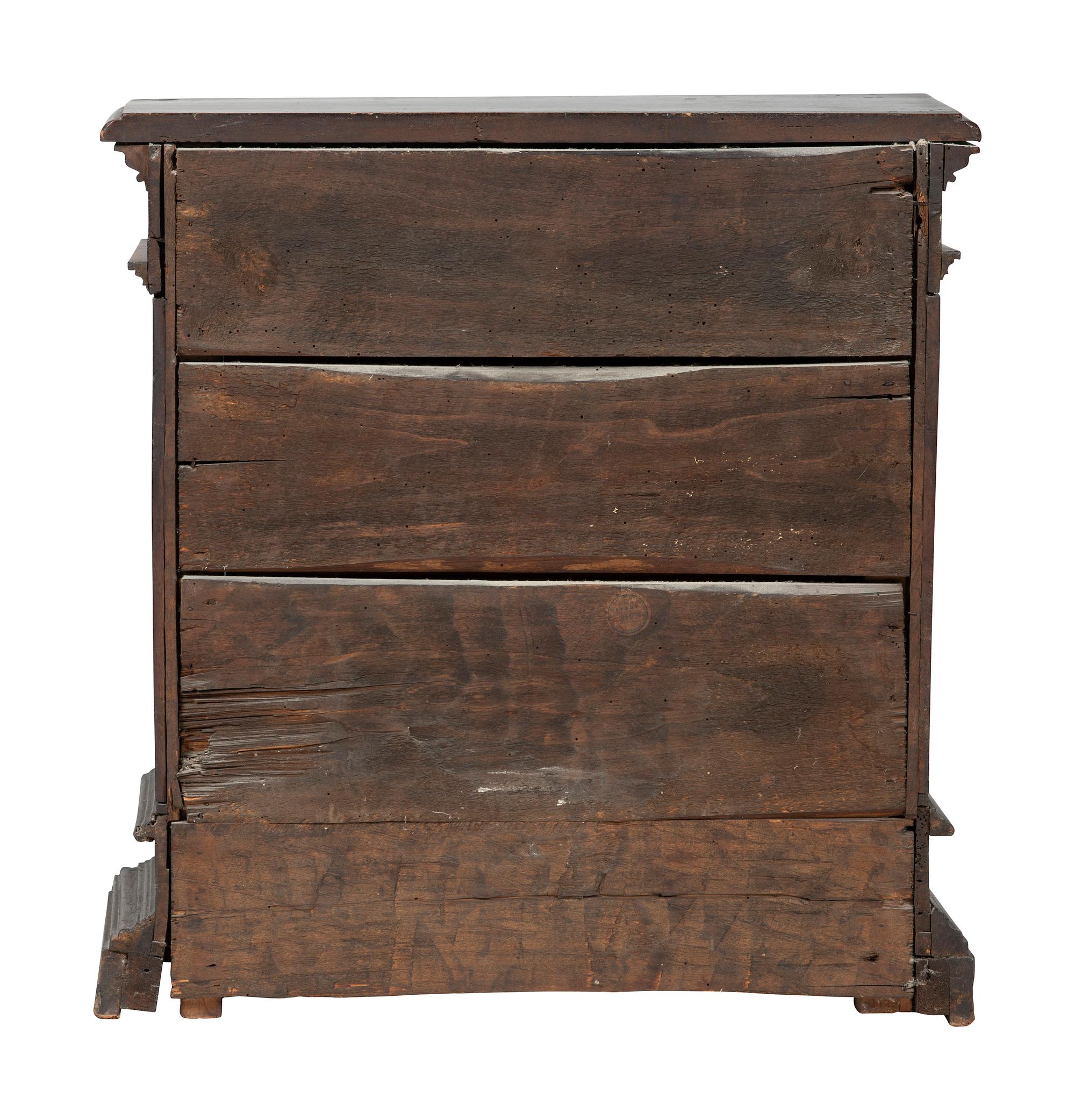 A Continental Floral Carved Walnut Diminutive Chest
