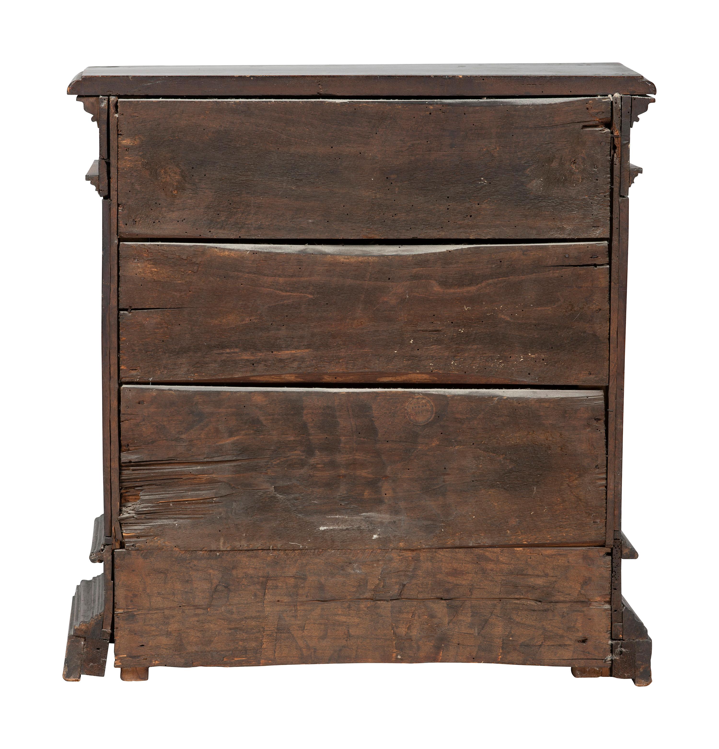 A Continental Floral Carved Walnut Diminutive Chest