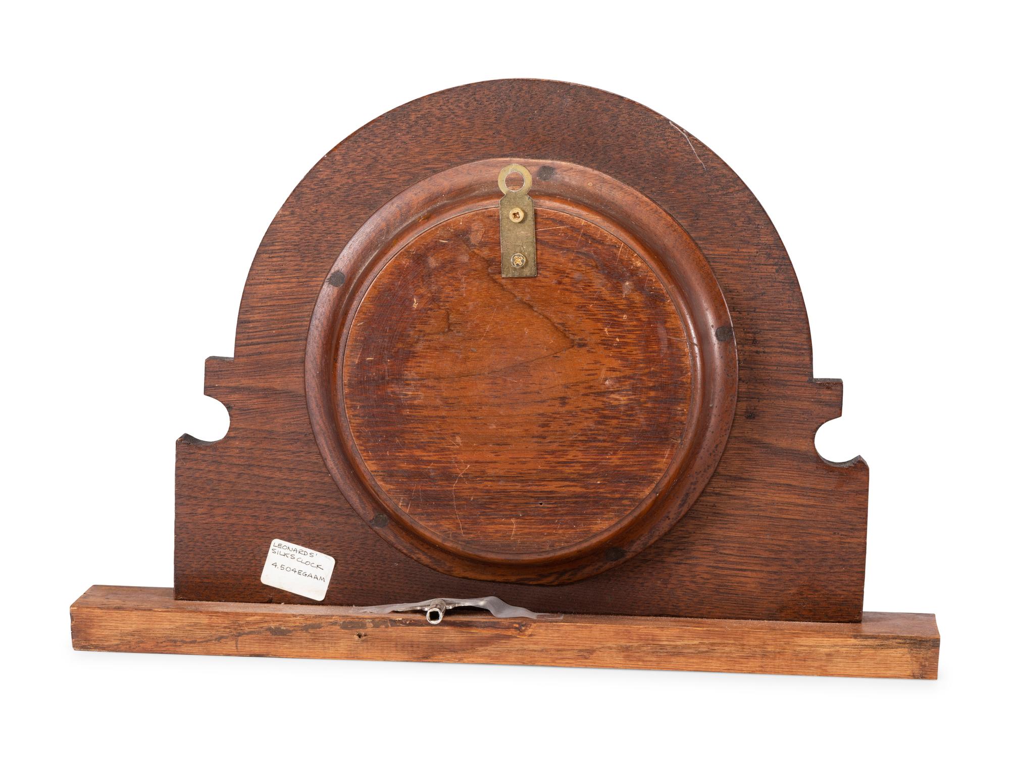 A Leonard Silks Advertising Mantel Clock