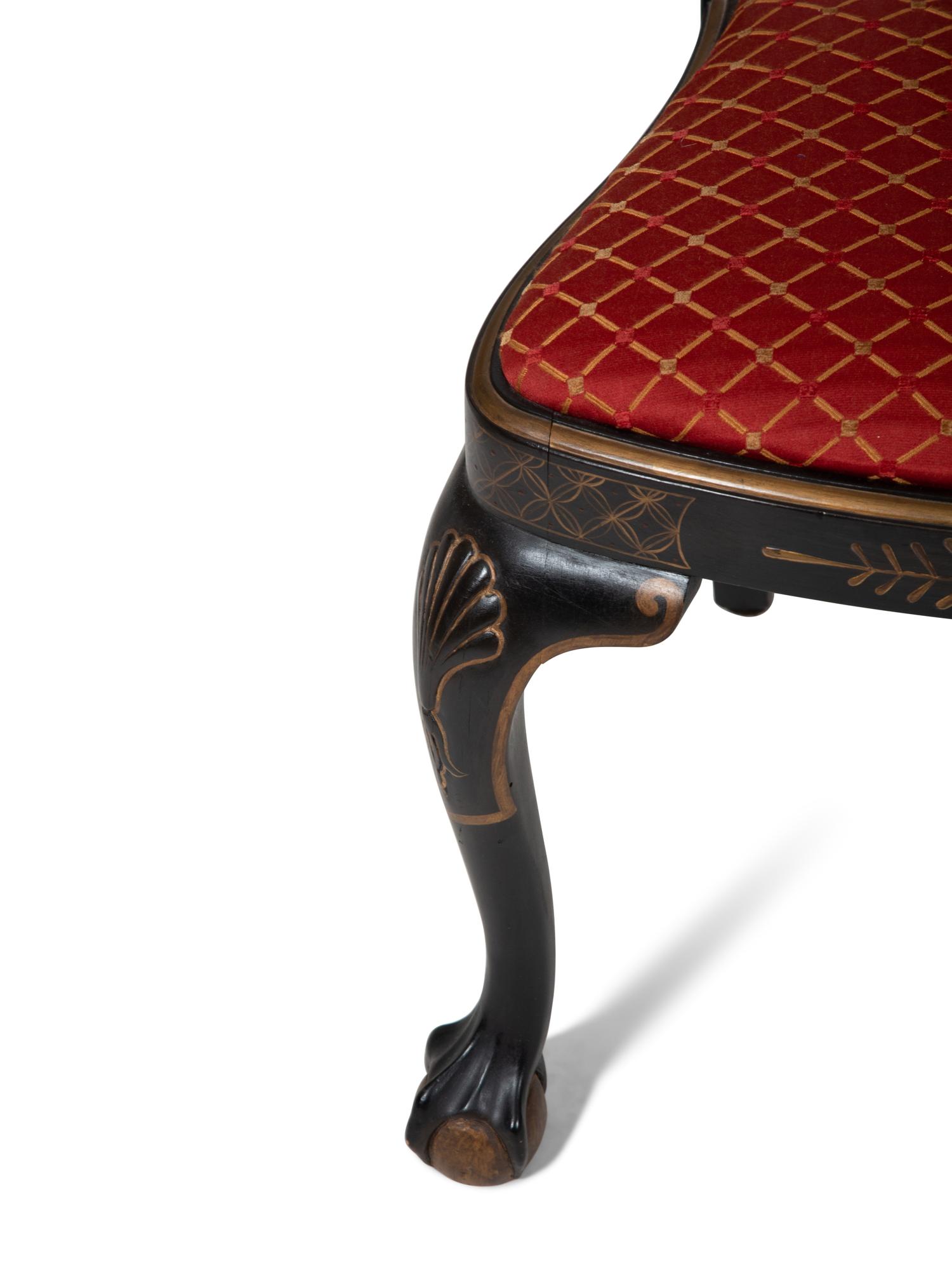 A Set of Eight George II Style Black and Gilt Japanned Dining Chairs