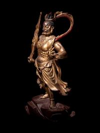 A Pair of Gilt and Red Lacquered Wood Figures of Guardians