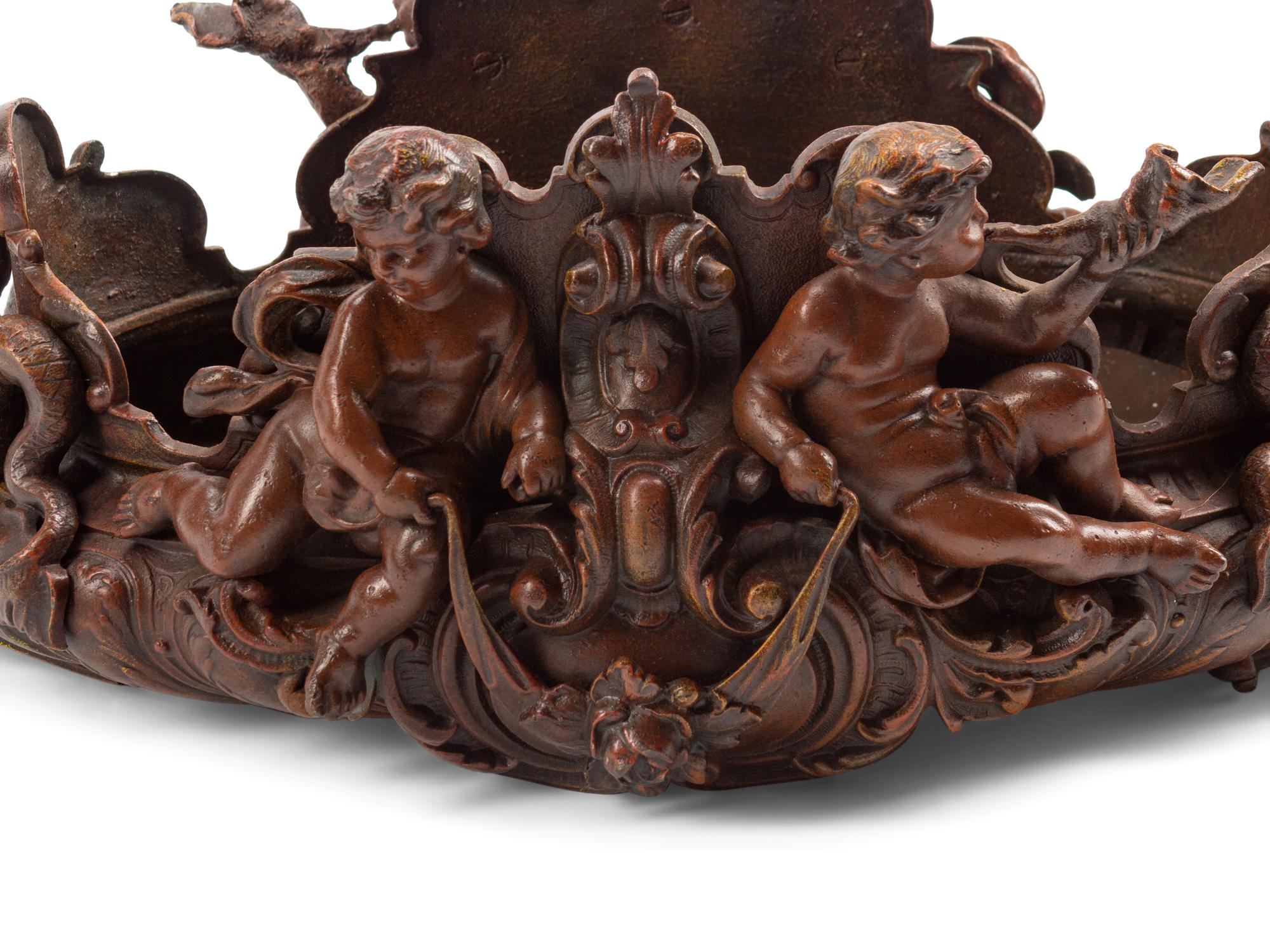 A Rococo Style Patinated Bronze Figural Jardinière