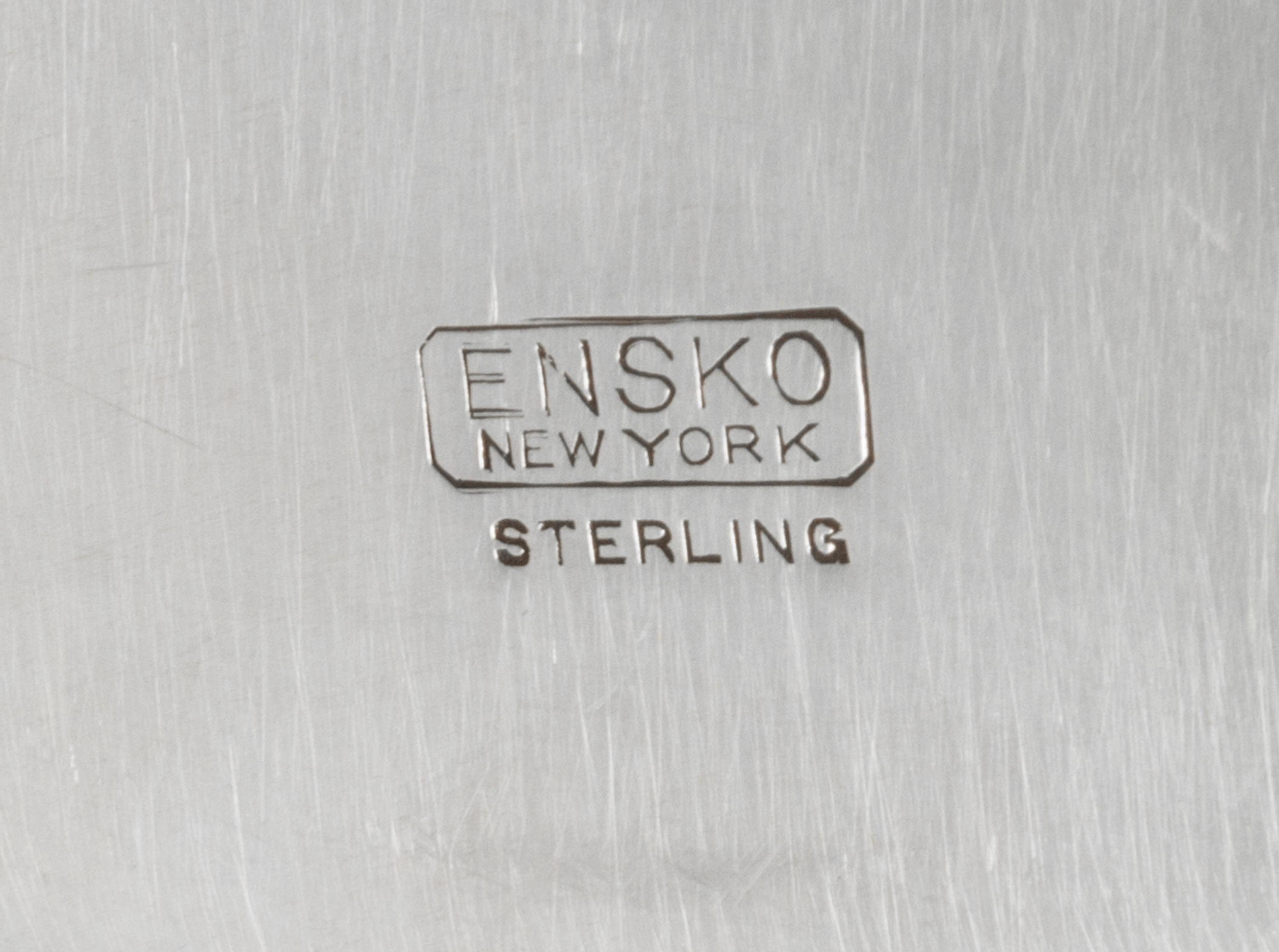 A Set of Twelve American Silver Bread Plates, Ensko, New York, NY, First half 20th century, each of circular form with a stepped border