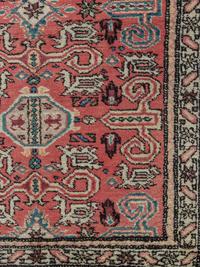 A Peperdil Wool Rug