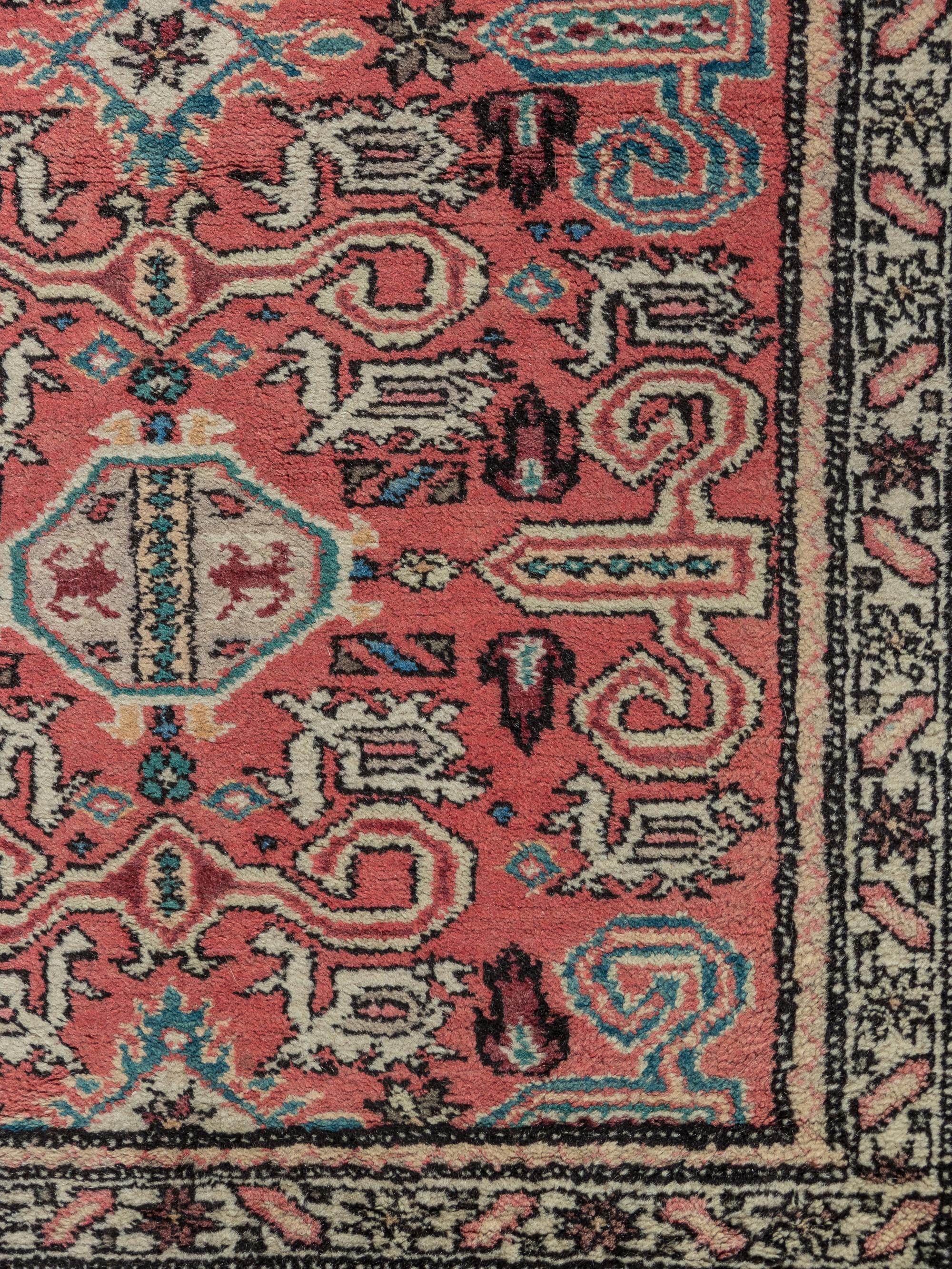 A Peperdil Wool Rug
