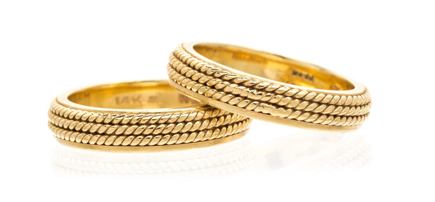 A Pair of 14 Karat Yellow Gold Rings, 7.60 dwts.