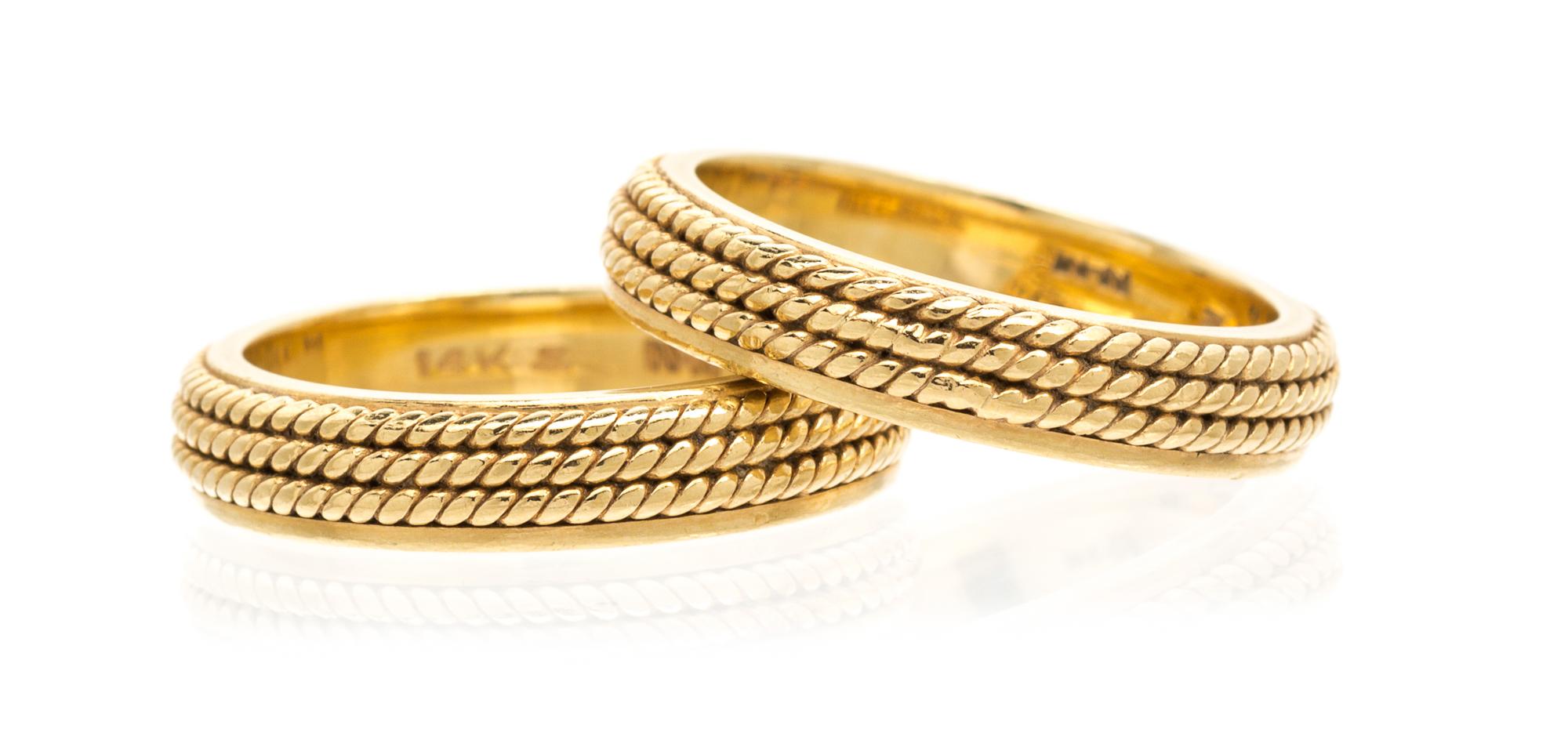 A Pair of 14 Karat Yellow Gold Rings, 7.60 dwts.