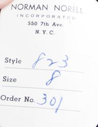 A Norell Black Wool Strapless Dress,