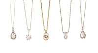 A Collection of Gold and Diamond Pendants, 8.80 dwts.