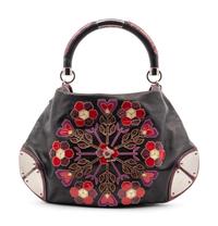 Collection of Four Designer Bags; One YSL, Two Moschino, One Gucci, 1980s-2007