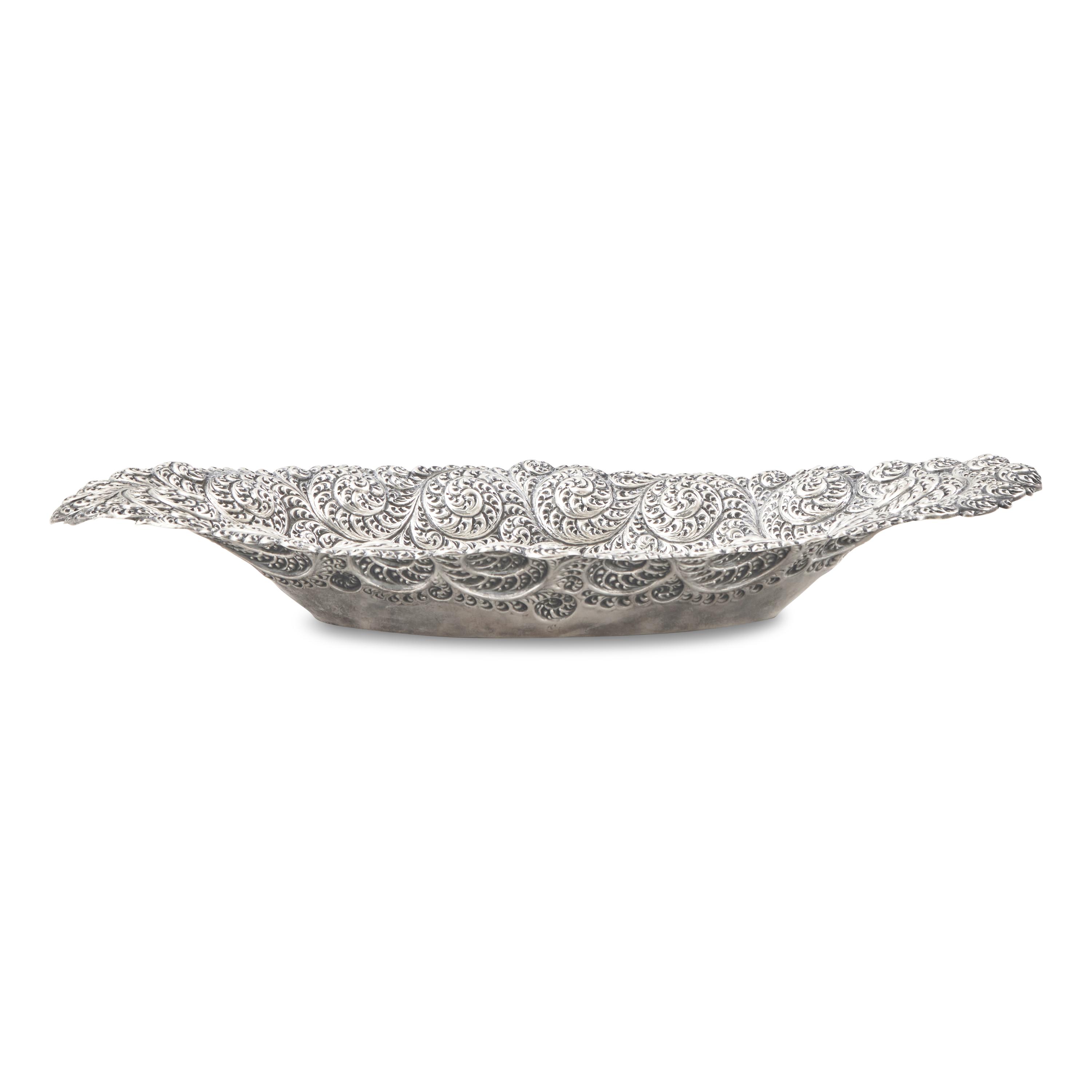 An American Aesthetic Movement Silver Repousse Bread Dish