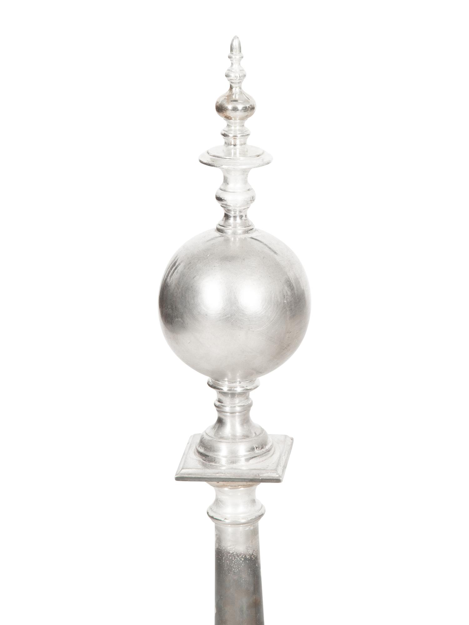A Pair of Silvered Brass Andirons