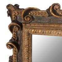 An Italian Baroque Style Parcel Gilt and Paint Decorated Mirror