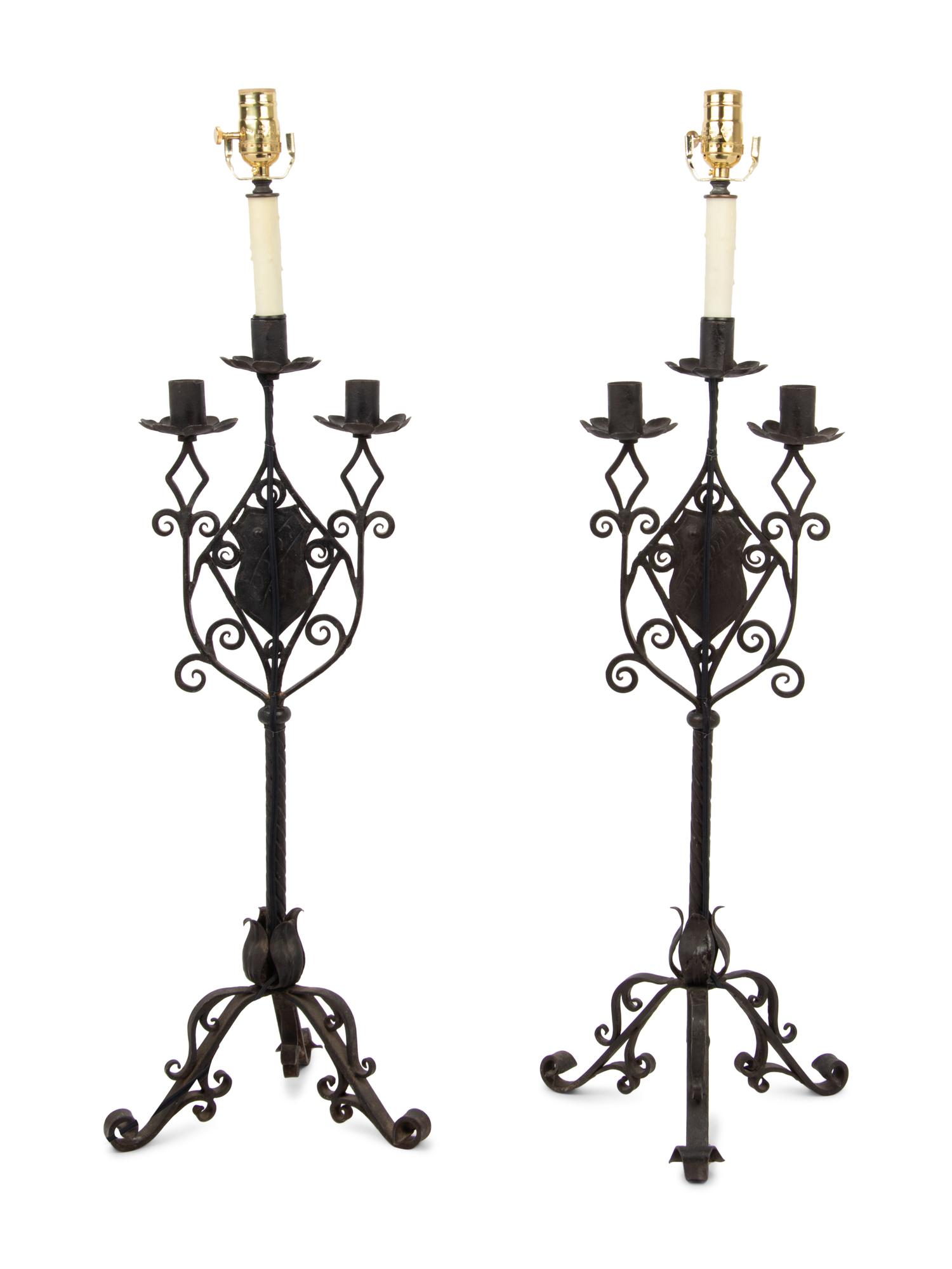 A Pair of Continental Iron Three-Light Candelabra Mounted as Lamps