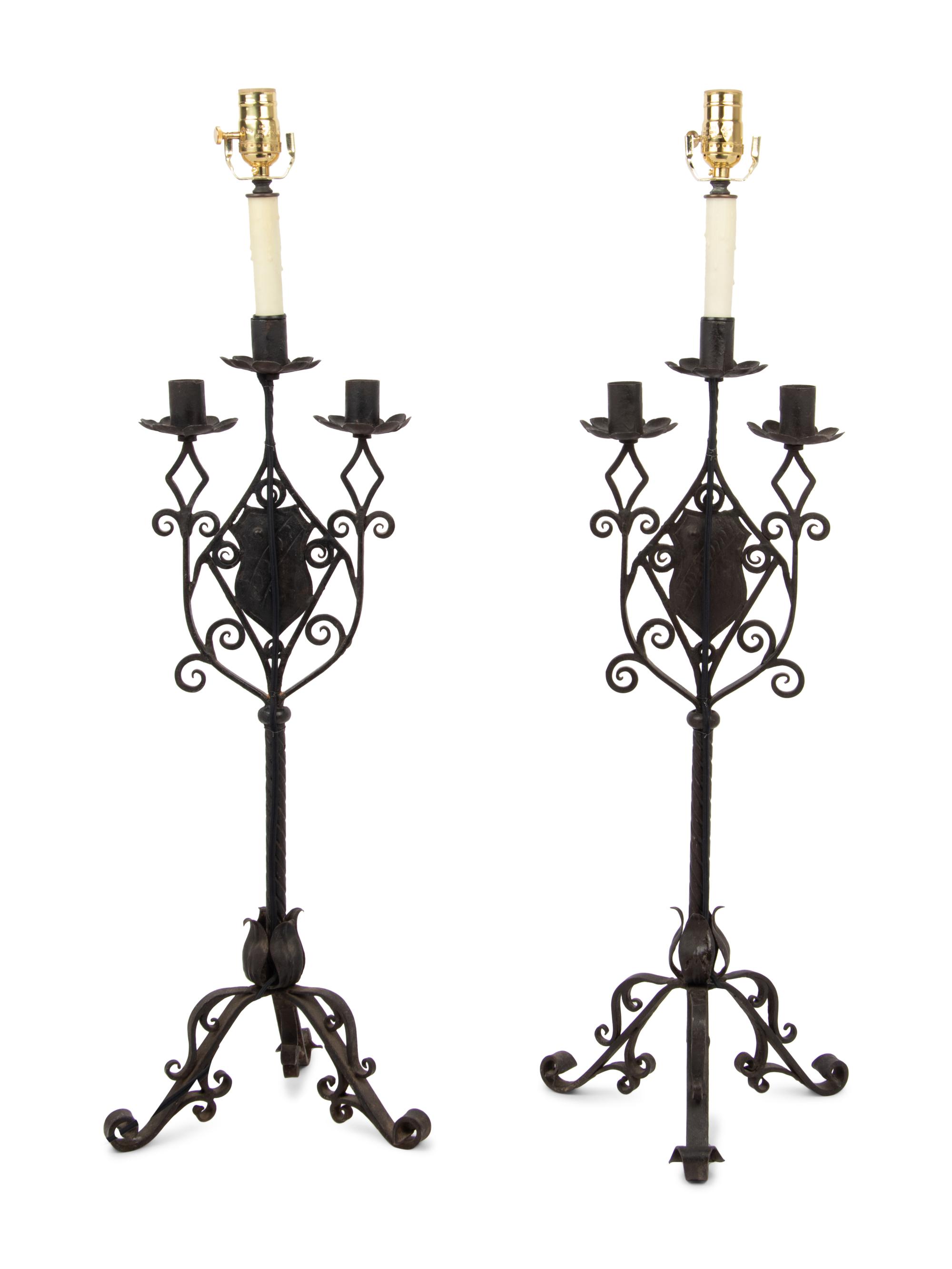 A Pair of Continental Iron Three-Light Candelabra Mounted as Lamps