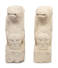 A Pair of Gothic Style Carved Marble Ornaments