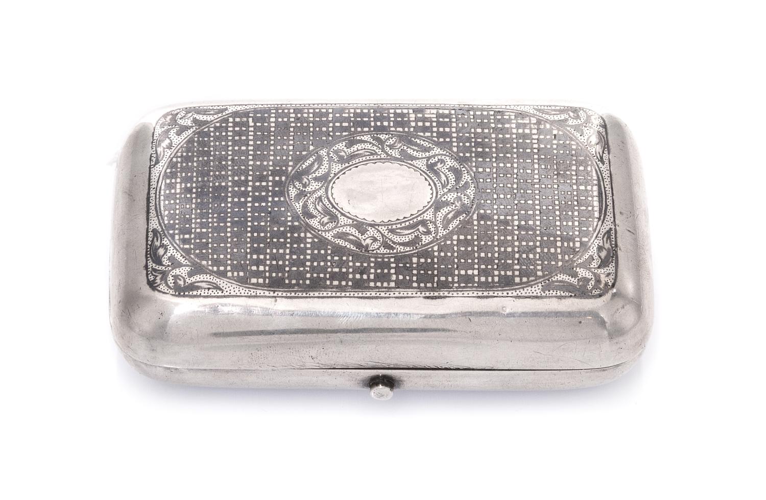 A Russian Niello Silver Cigarette Case, Maker's mark Cyrillic NF, assay mark of Viktor Savinsky, Moscow, 1878, the lid centered by an o