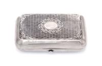 A Russian Niello Silver Cigarette Case, Maker's mark Cyrillic NF, assay mark of Viktor Savinsky, Moscow, 1878, the lid centered by an o