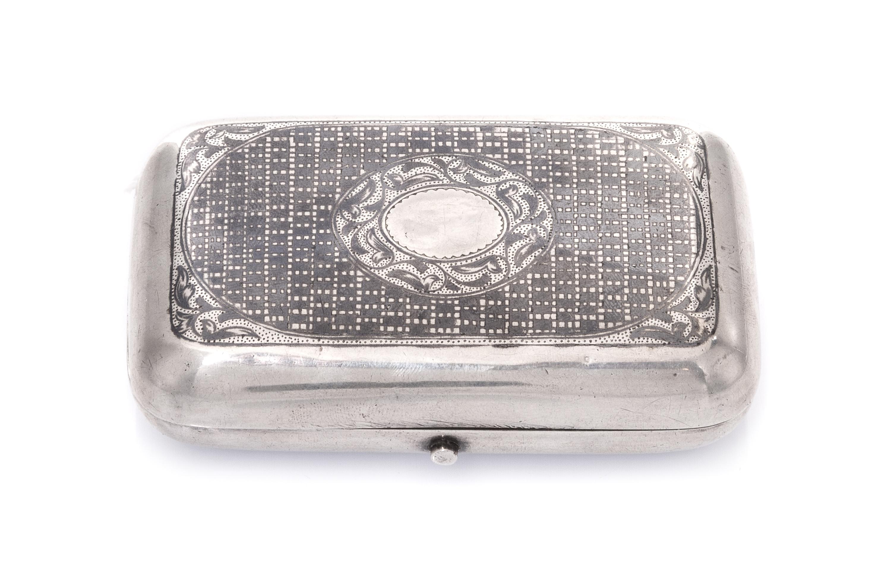 A Russian Niello Silver Cigarette Case, Maker's mark Cyrillic NF, assay mark of Viktor Savinsky, Moscow, 1878, the lid centered by an o